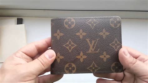 louis vuitton wallet serial number location.